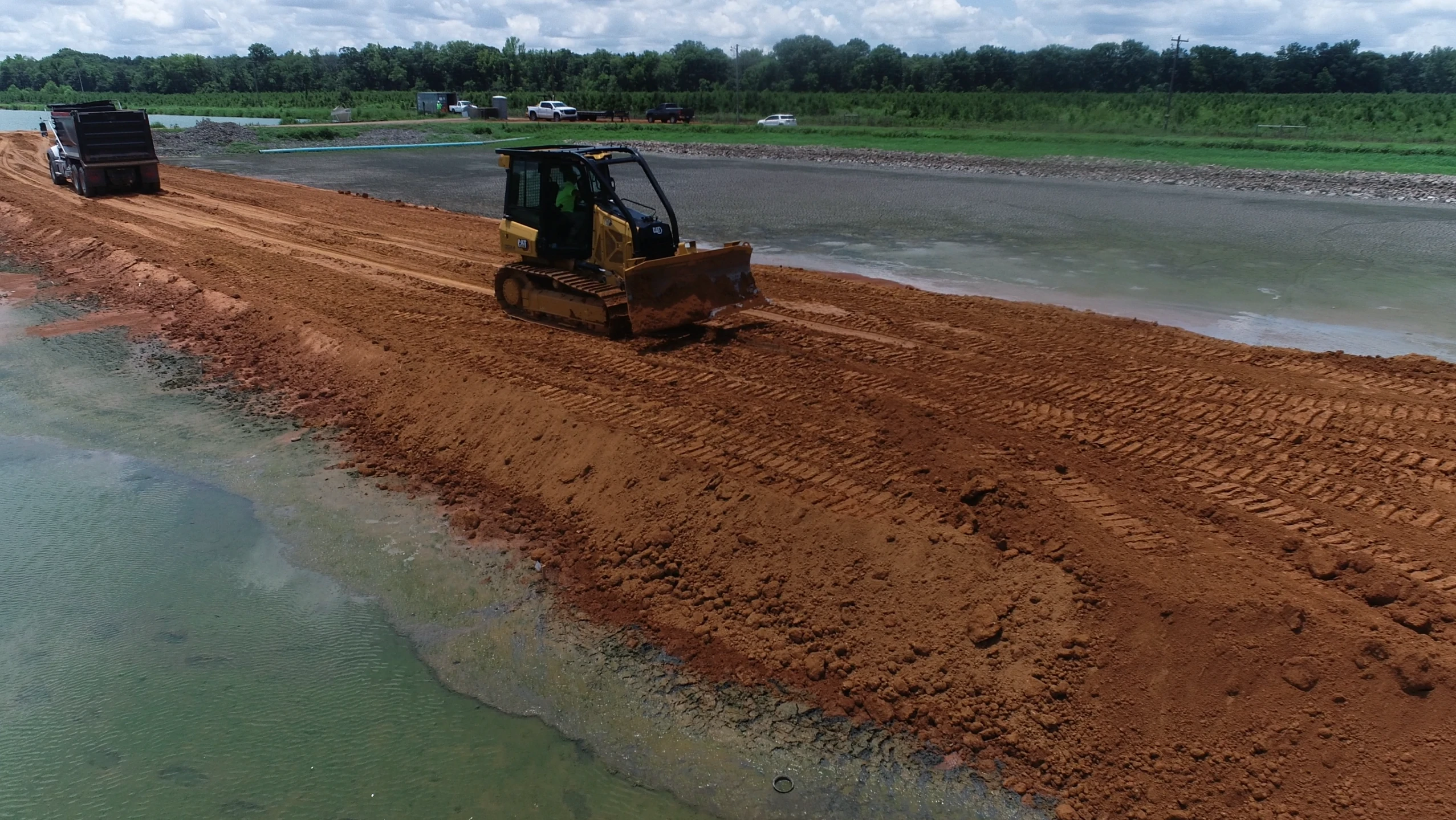 Bulldozer on a constructed levee